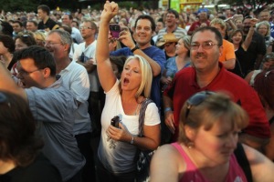 Fairgoers cheer for Sarah Palin Credit: Chip Somodevilla/Getty Images